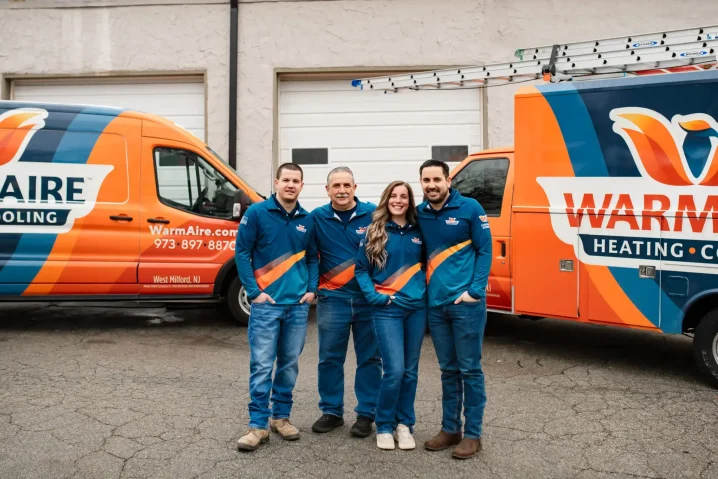Modern air conditioning unit on brick wall.