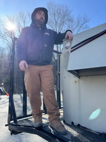 Modern air conditioning unit on building exterior.