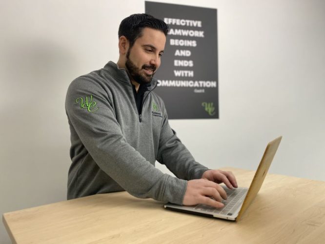 WarmAire Conditioning of Passaic County Owner on computer